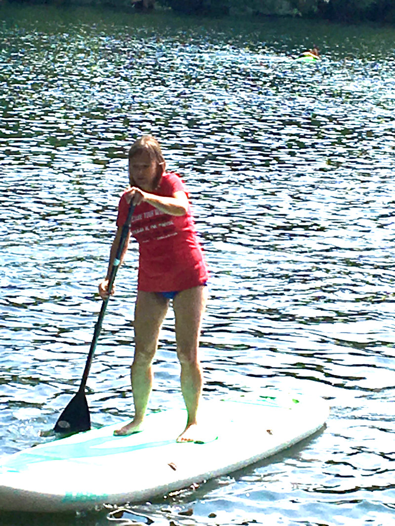 Stand up paddle boarding on the Schlachtensee Lake in Berlin