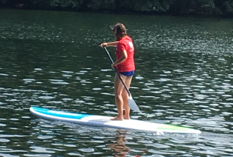Stand up paddle boarding on the Schlachtensee Lake in Berlin